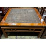 A Chinese square caned pine low table, width 97cm, height 51cm