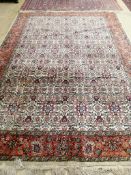 A Turkish ivory ground floral carpet, 360 x 250cm