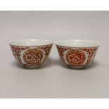 A pair of Chinese iron-red enamelled bowls, 11.5cm diameter