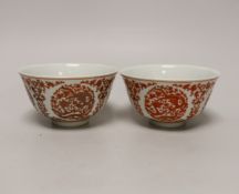 A pair of Chinese iron-red enamelled bowls, 11.5cm diameter