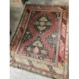 An antique Kazak rug, 190 x 140cm
