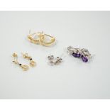 Four assorted modern pairs of 750 or 18ct gold and gem set earrings, including small solitaire