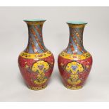 A pair of Chinese famille rose baluster vases, 29cm