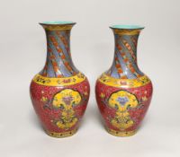 A pair of Chinese famille rose baluster vases, 29cm