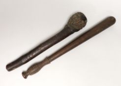 A truncheon with turned handle and a hardwood knobkerrie, the largest 47cm in length