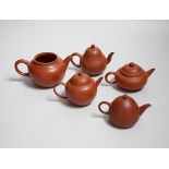Five Chinese Yixing small teapots, probably 19th/20th century, one cover lacking Provenance- from