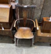 A 19th century Windsor elm and fruit wood comb back armchair with pierced central splat, width 51cm,
