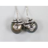 A modern pair of 750 white metal and diamond cultured set black pearl drop earrings, approx. 45mm,