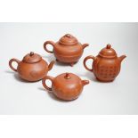 Four Chinese Yixing teapots, one slip decorated with a landscape Provenance- from a collection of