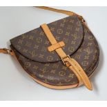 A Louis Vuitton lady’s handbag, horseshoe shaped, 28cm wide