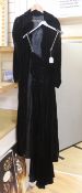 A late 1930's early 40's ‘Harrods’ labelled black velvet full length evening dress with diamanté