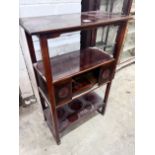 A Japanese hardwood three tier etagere, width 66cm, depth 31cm, height 98cm