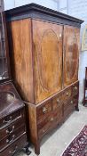 A George III banded mahogany linen press converted to a hanging wardrobe, width 147cm, depth 64cm,