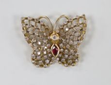 A French yellow metal (18ct poincon mark), diamond and ruby? set cluster pendant, modelled as a
