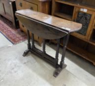 A small late 17th century oak oval topped gateleg dining table, width 83cm, depth 27cm, height 66cm