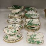An early 19th century thirty-six piece part dessert service decorated with flowers, the largest 30cm