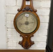 A Victorian pollard oak barometer and thermometer marked Warren of Hastings, height 92cm