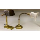 Two early 20th century brass reading lamps with Bakelite and etched opaque glass shades, the largest