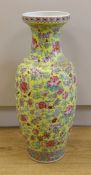 A large Chinese famille rose yellow ground baluster vase, 62cm high