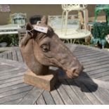 A cast iron horse head garden ornament, height 44cm