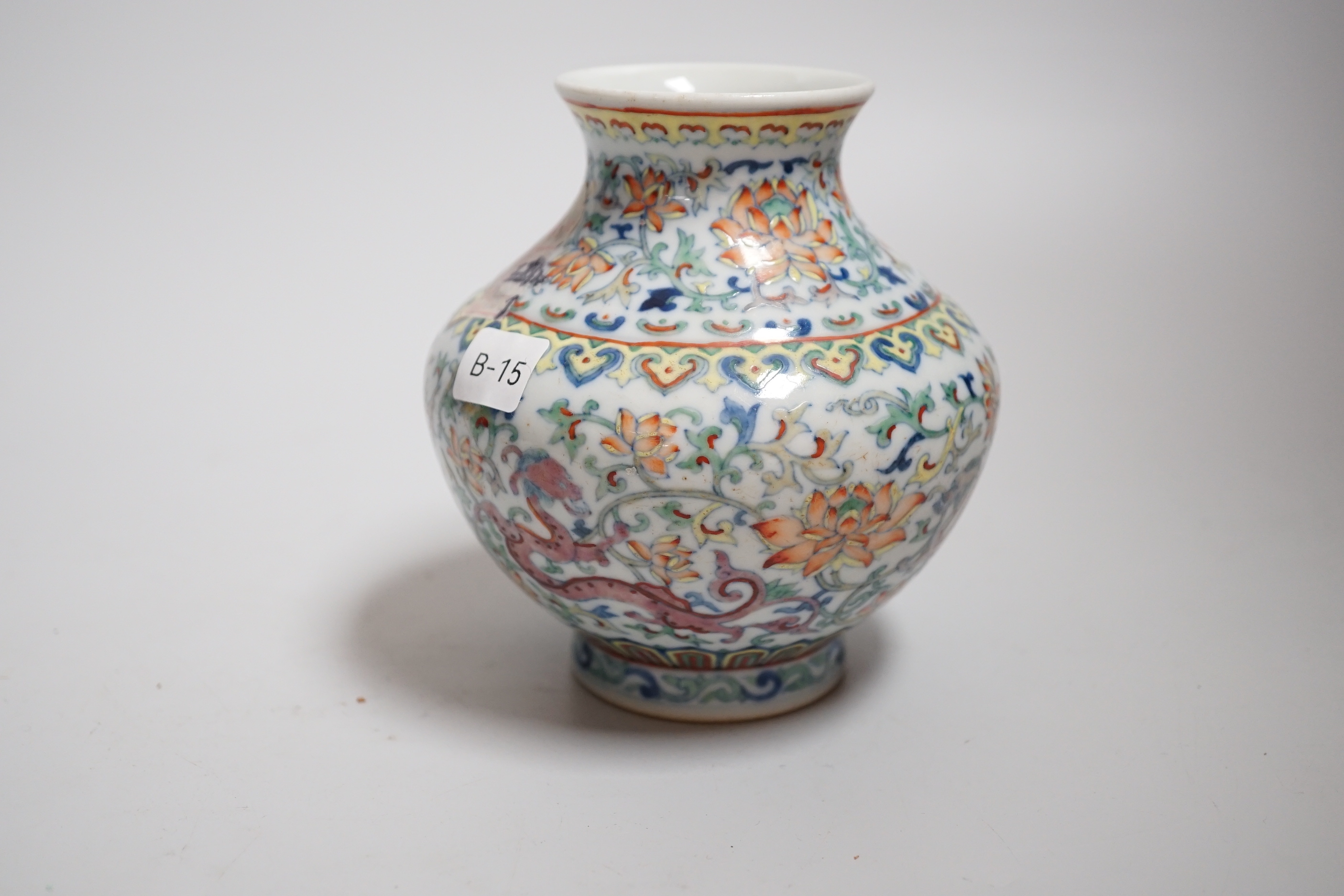 A small Chinese doucai jar, decorated with dragons and lotus flowers, housed in a fitted case, 12. - Image 2 of 4