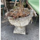 A set of three reconstituted stone garden planters (lacking two bases), diameter 46cm.