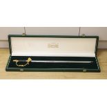 A Wilkinson presentation sword with etched blade, in Harrods case, blade 60cm