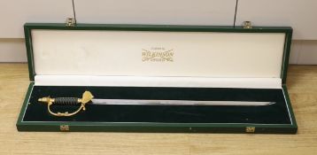 A Wilkinson presentation sword with etched blade, in Harrods case, blade 60cm