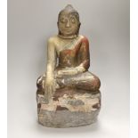 A 19th century Burmese painted alabaster figure of Buddha, damaged, 38cm