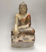 A 19th century Burmese painted alabaster figure of Buddha, damaged, 38cm