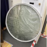 A large circular moulded abstract glass panel, diameter 94cm