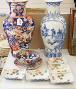 A Japanese Imari vase, a Chinese blue and white vase, two dishes, a bowl and a set of five dishes (