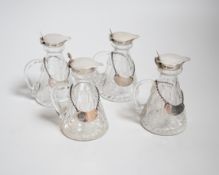 A set of four George VI silver mounted cut glass whisky noggins by Hukin & Heath, Birmingham,