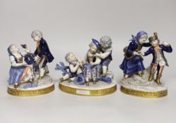 Three German porcelain figure groups, the pair 17cm