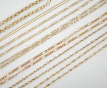 Six assorted modern 9ct gold chains, longest 54cm and a 9ct gold rope twist bracelet, 18cm, 18.5