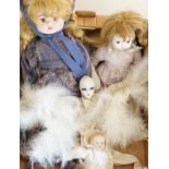 Four modern bisque dolls, largest 56cm