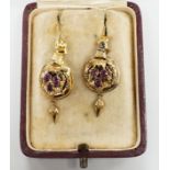 A pair of 19th century yellow metal and three stone garnet set drop earrings, overall 40mm, gross