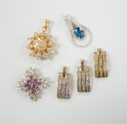 Five assorted modern 9ct gold and gem set pendants, including a set of three demi-lune, 20mm,