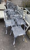 A set of six aluminium garden elbow chairs