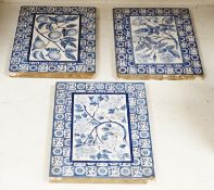 Three Victorian blue and white Mintons tiles decorated with flowers and fruit, each stamped to the