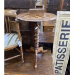 A Victorian inlaid walnut circular tripod games table, diameter 49cm, height 69cm together with a