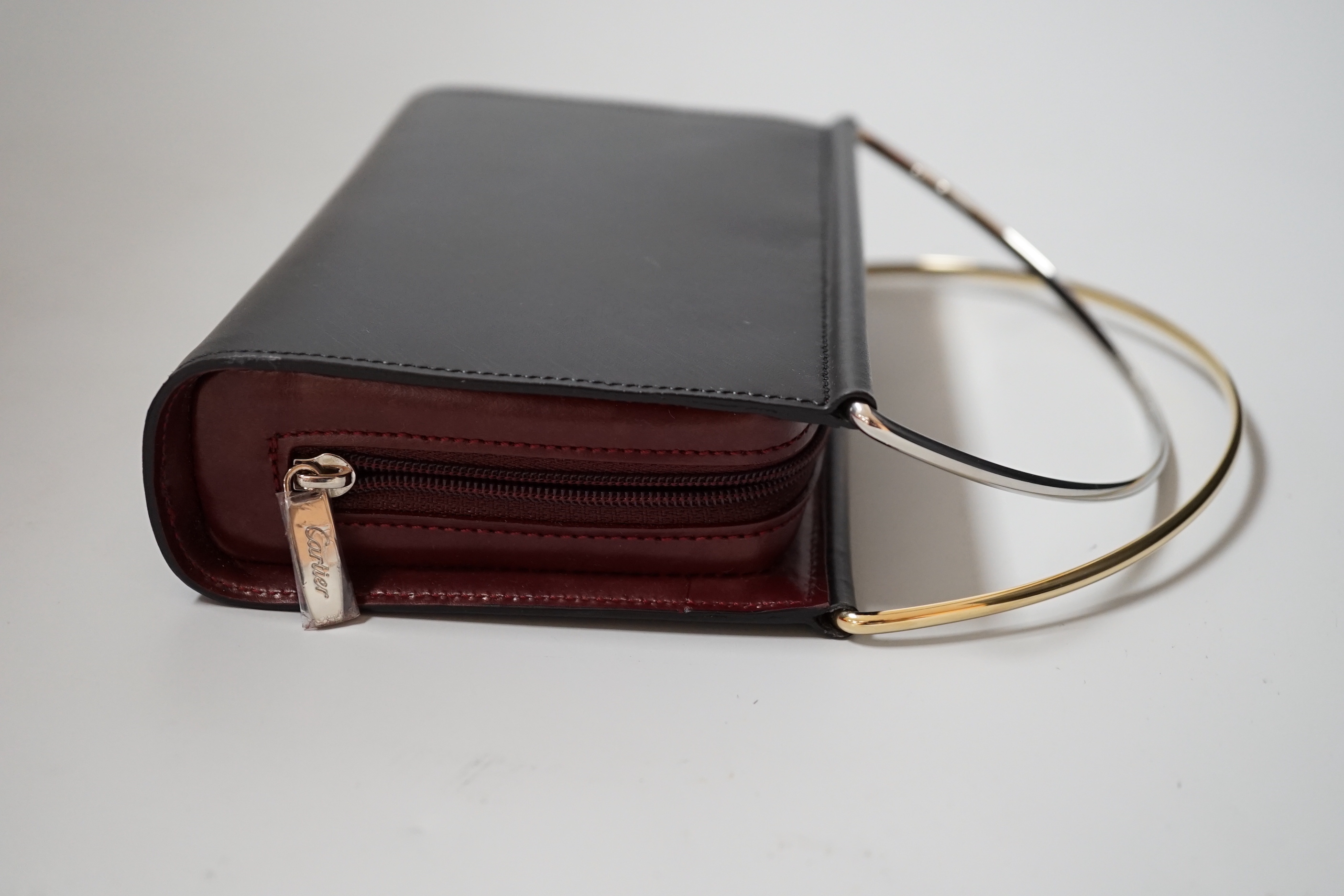 A small Cartier lady’s leather evening bag, 16cm wide, with original box - Image 2 of 2