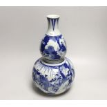 A Chinese blue and white double gourd vase, 33cm
