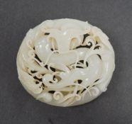 A 17th/18th century Chinese white jade ‘dragon’ belt buckle, 7cm