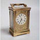 A brass mantel timepiece, retailed by Mappin and Webb, 13cm