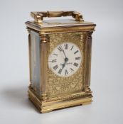 A brass mantel timepiece, retailed by Mappin and Webb, 13cm