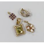 Two modern 14k and gem set pendants, one 750 and amethyst cluster set pendant and a 14k and