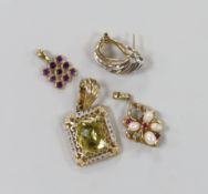 Two modern 14k and gem set pendants, one 750 and amethyst cluster set pendant and a 14k and