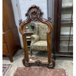 A Victorian style carved mahogany wall mirror, width 63cm, height 120cm