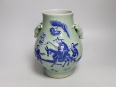 A Chinese underglaze blue and slip decorated celadon ground celadon vase, hu, 23cm high